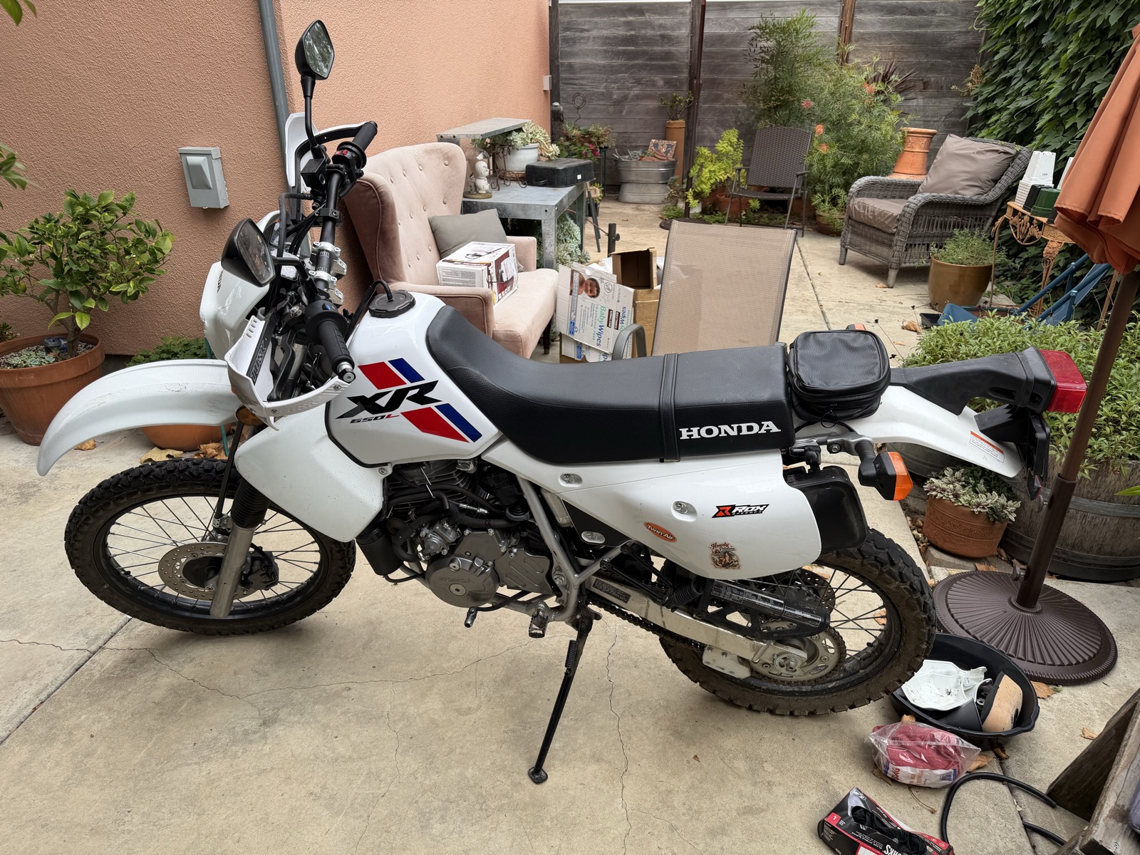 Before the swap: the XR with its stock tank